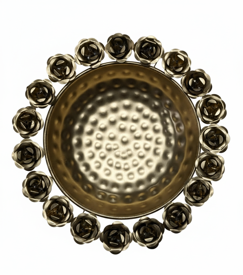 Golden metal bowl with floral rim design